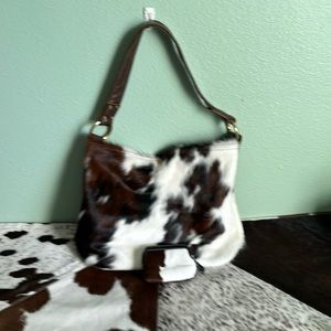 Wild Goose hair on hide lightly used with coin/card pouch